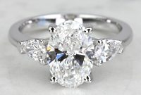 the-allure-of-the-oval-diamond-with-pear-side-stones-a-symphony-of-elegance-and-brilliance
