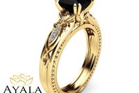 the-enigmatic-allure-black-diamond-yellow-gold-engagement-rings